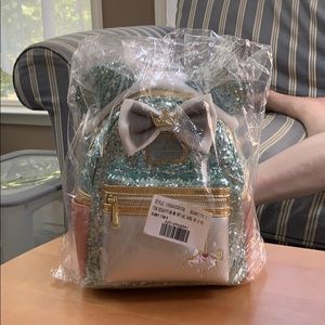 Loungefly Disney’s Main Attraction July backpack